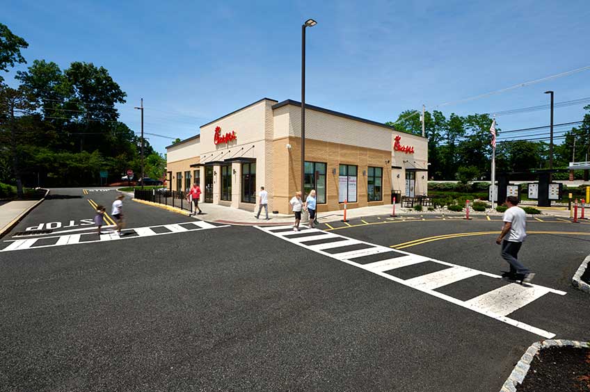 Sidewalk and shop storefront at Briarcliff Commons shopping center.