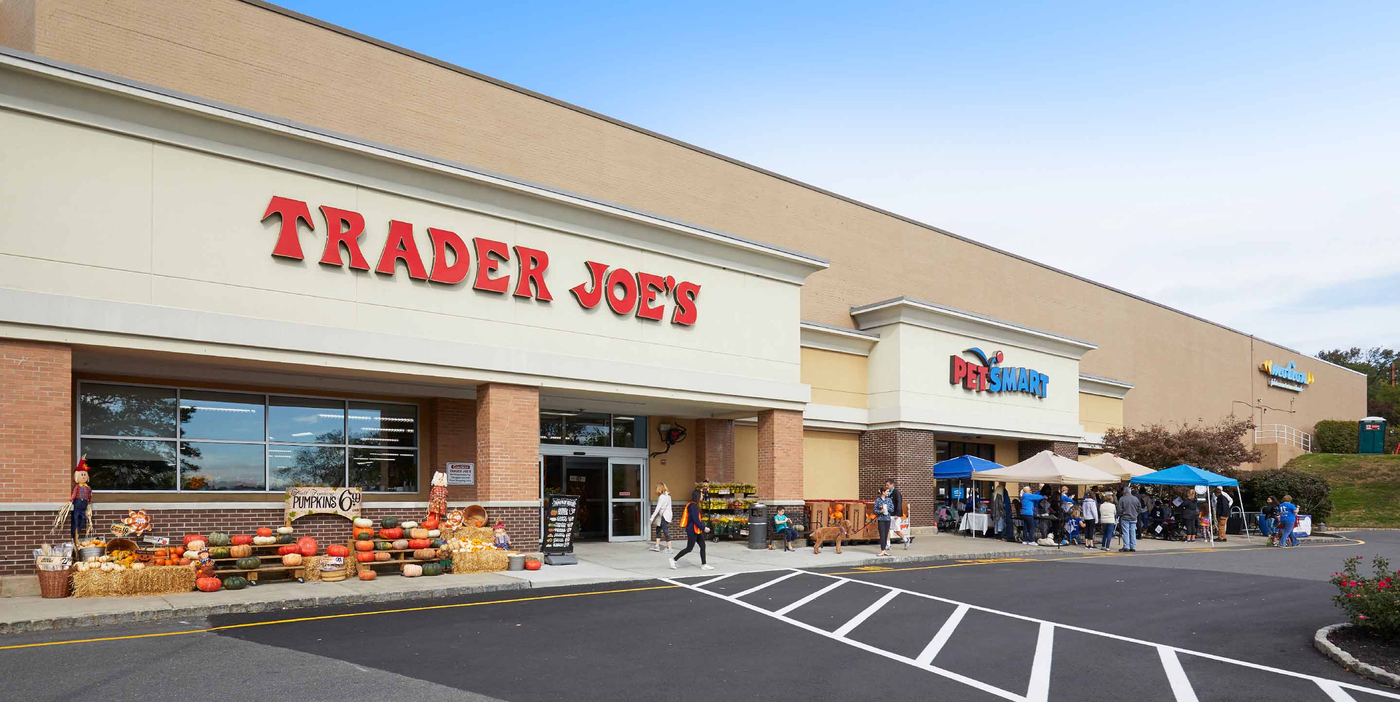 Image of Millburn Gateway Center shopping center with various shops.