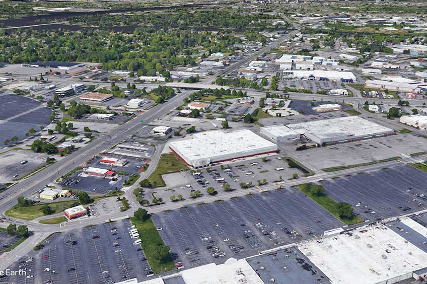 Aerial view of Norfolk (J.A.N.A.F. Shopping Yard) and its adjacent parking lot, captured from a high vantage point.