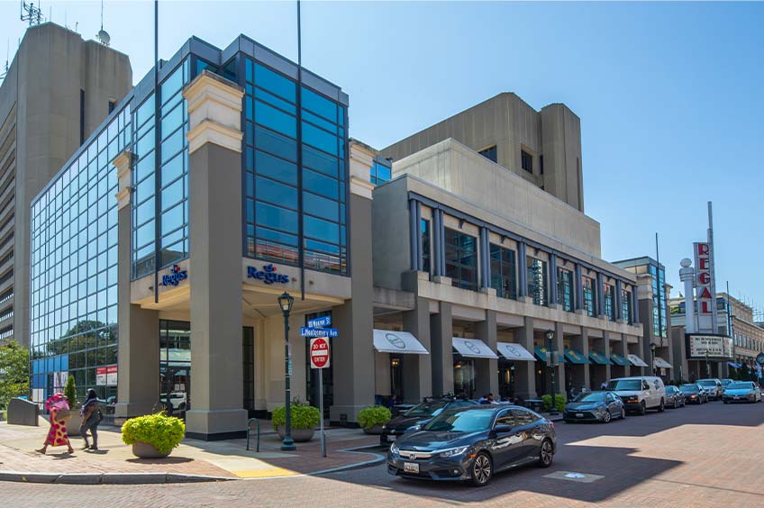 View of Rockville Town Center shopping center with various stores.