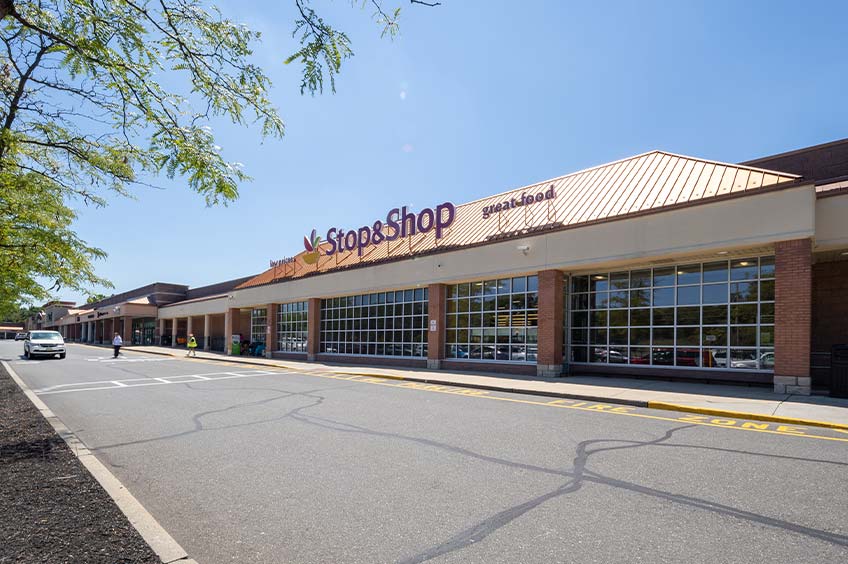 Storefront at Town Brook Commons shopping center.