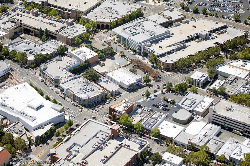 Aerial view of Walnut Creek - Mt. Diablo shopping center and its adjacent parking lot, captured from a high vantage point.