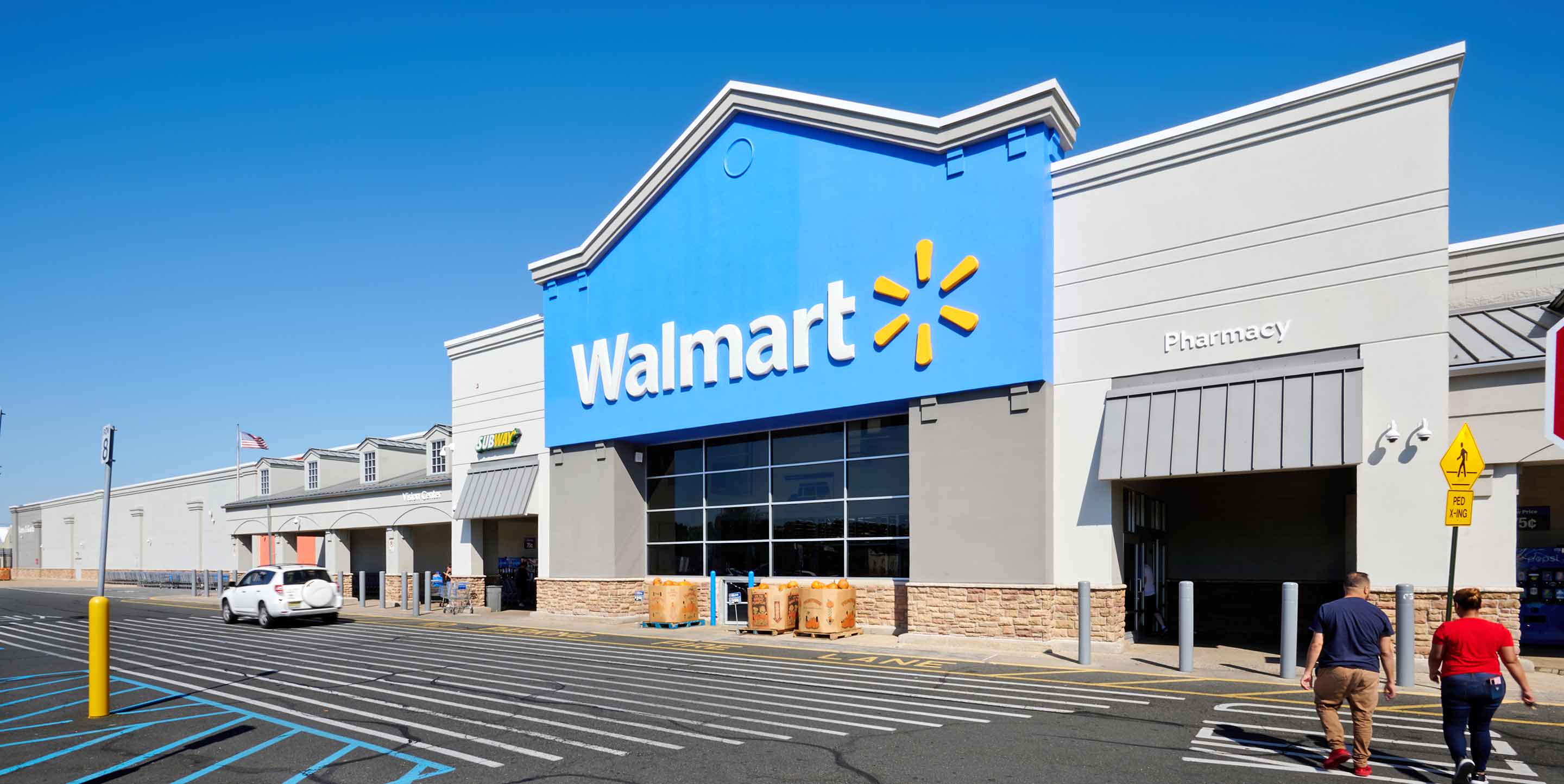 Walmart storefront at Woodbridge Commons shopping center.