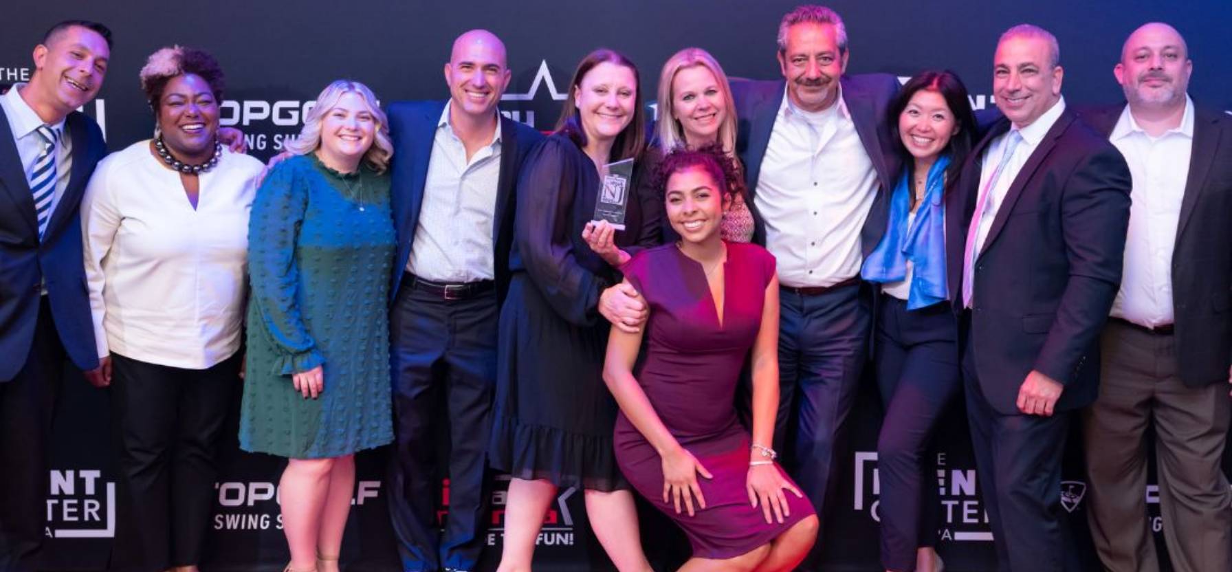 Group photo of staff members at an event