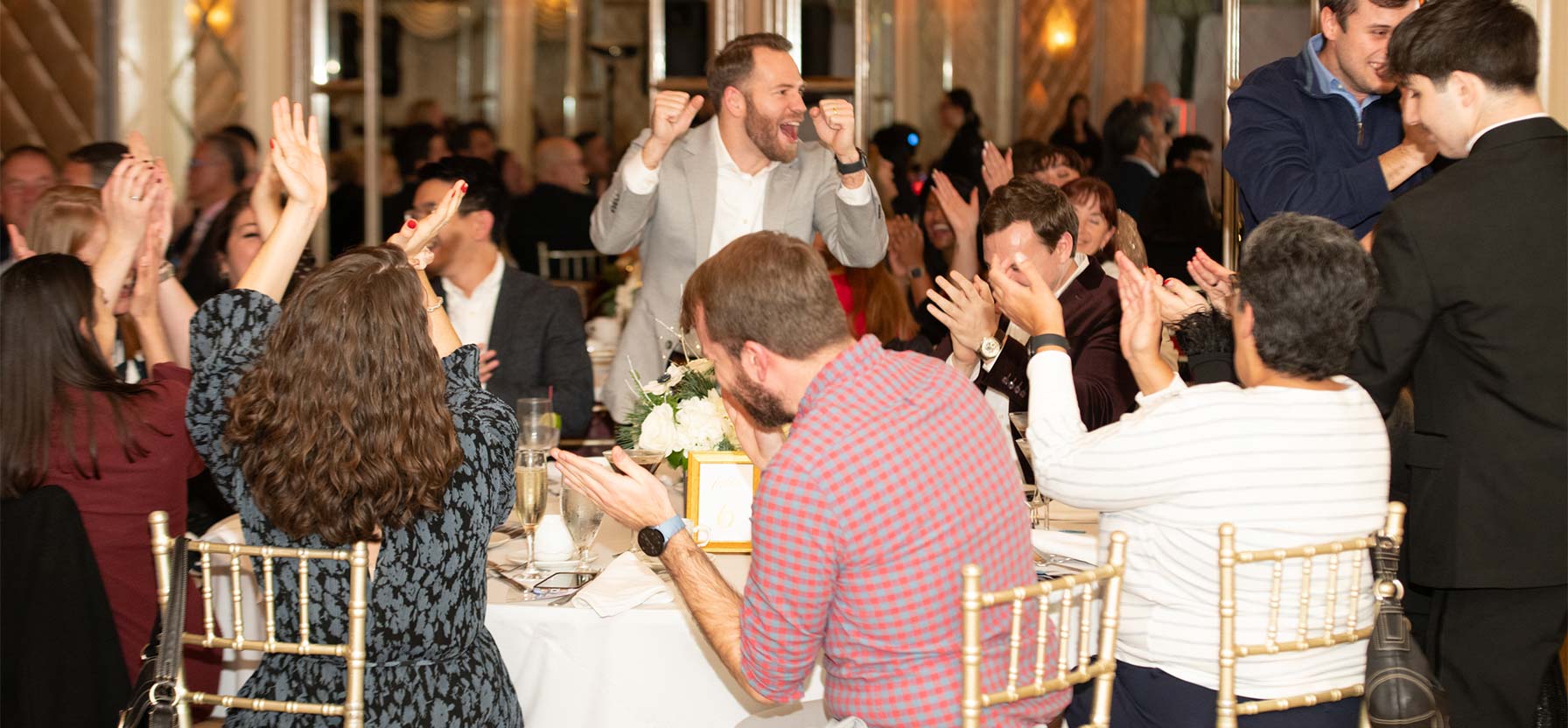 Staff members at a dinner party